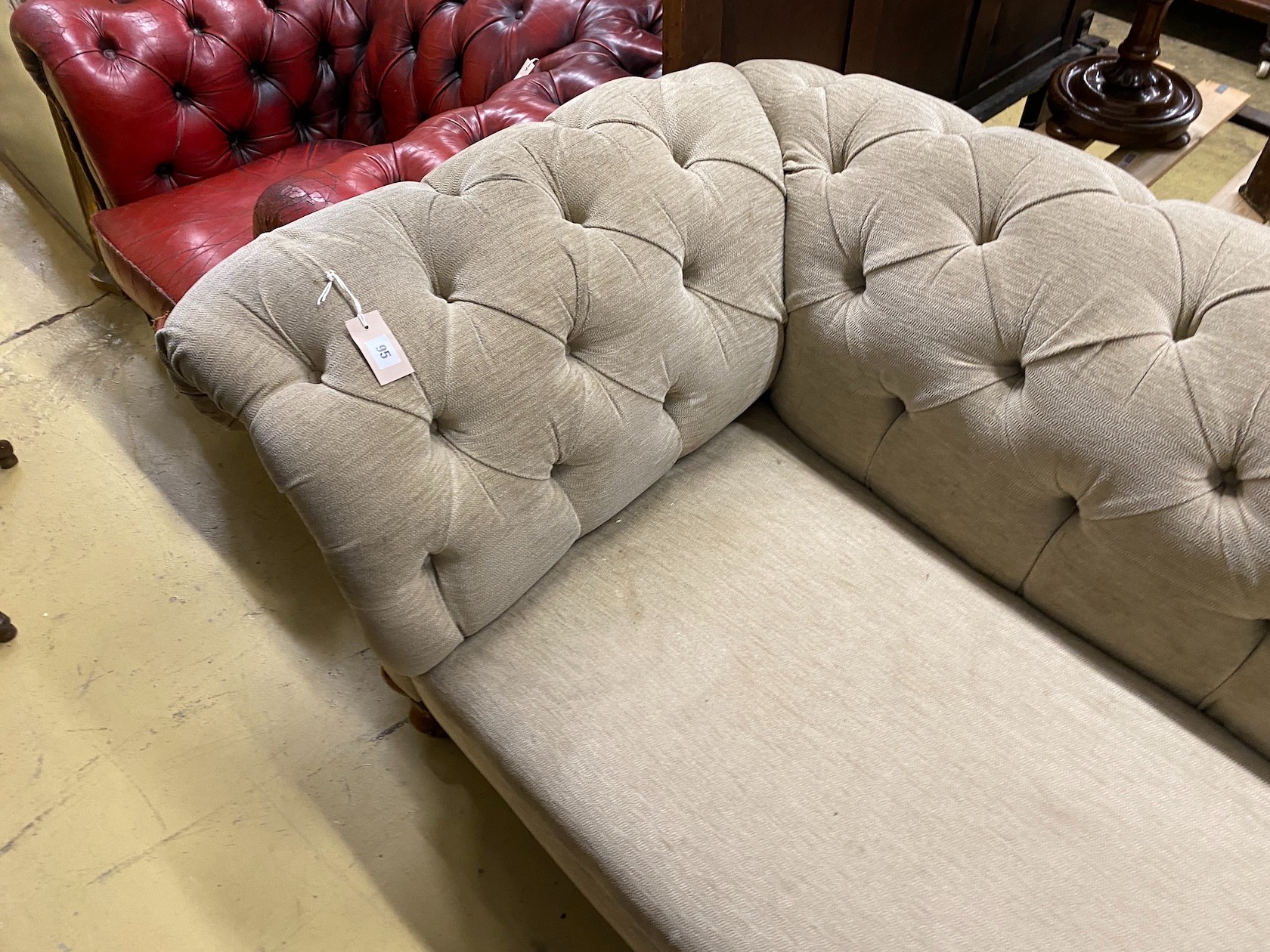 A Victorian Chesterfield settee upholstered in buttoned pale green fabric, length 190cm, width 90cm, height 75cm